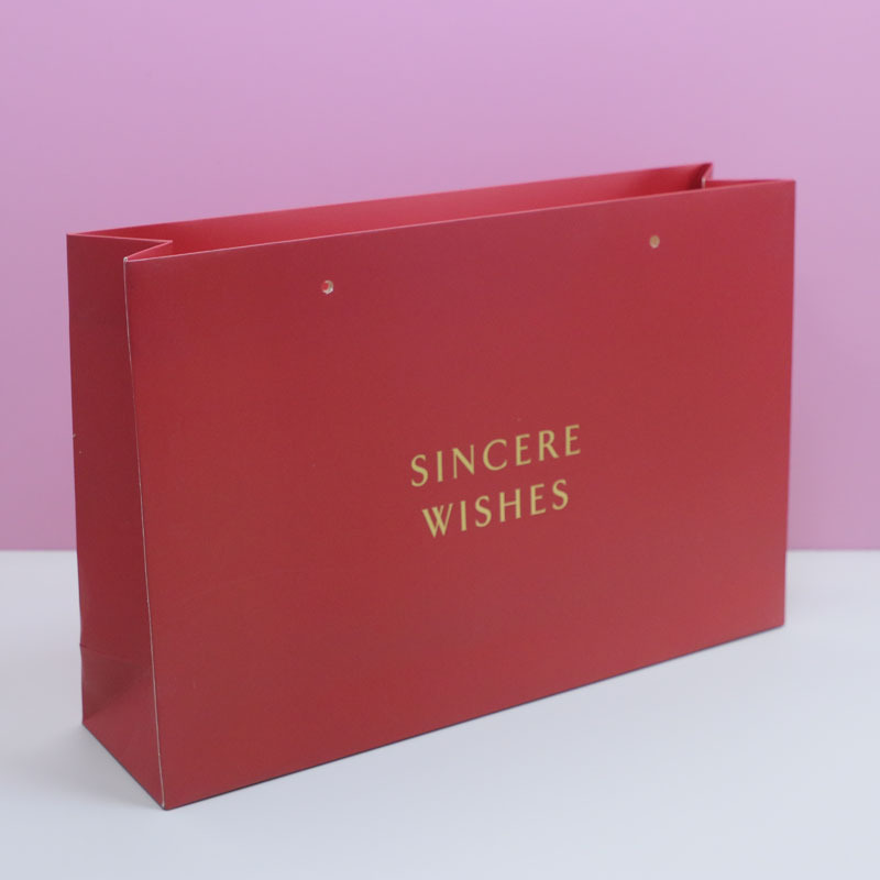 Sac en papier avec logo doré