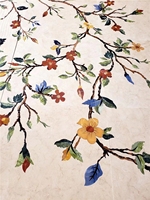 Médaillon en marbre découpé au jet d'eau pour sol d'hôtel, motif floral