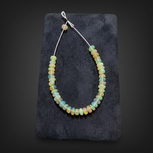 Ópalo etíope natural pulido liso en forma de rondel, cuentas sueltas de piedras preciosas multicolor, Gopika Exports para la fabricación de joyas. - Product Image 4