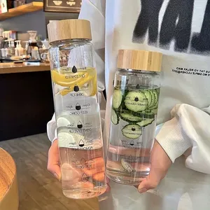 Botella de agua de vidrio de borosilicato de gran capacidad, transparente, 24oz, 34oz, marcador de tiempo, botella de leche para bebidas con tapa de Bambú - Product Image 1