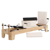 Fabricant ODM : Machine de Pilates en baril d'acacia avec rouleaux silencieux, ressorts réglables, durable, écologique, pour le yoga professionnel