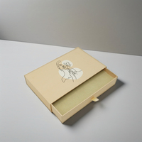Vente en gros de petite boîte cadeau avec logo personnalisé carton rigide avec laminage mat gaufrage tiroir en papier coulissant boîte d'emballage pour bijoux