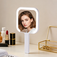 Espejo de Maquillaje Iluminado, Espejo de Aumento con Luz y Brillo Ajustable, Espejo de Mano con Mango