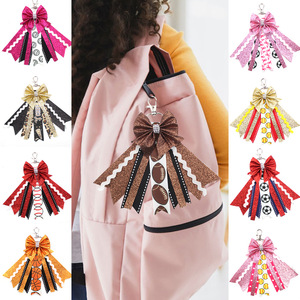 Porte-clés nœud sportif scintillant avec centre en strass, breloque de sac nœud de cheerleading pour les fans de football, basketball, soccer, <span class=keywords><strong>volley</strong></span>-ball - Product Image 1