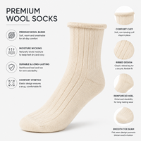 Chaussettes en laine mérinos mi-mollet OEM de haute qualité, épaisses, tricotées sur mesure, chaudes, pour l'automne et l'hiver