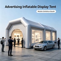 Tente publicitaire gonflable commerciale avec panneaux transparents et structure renforcée pour la planification d'événements et la promotion de marque