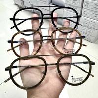 Grossiste en montures de lunettes en acétate solide, assortiment de styles variés, élégants et tendance, lunettes optiques bon marché et styles variés pour unisexe