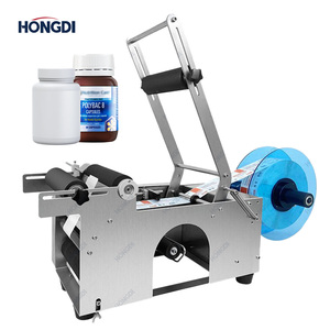 Machine d'étiquetage manuelle économique pour bouteilles en verre rondes, facile à utiliser, applicateur d'étiquettes pour l'emballage des petites entreprises - Product Image 1