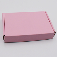Cartons en carton de logo personnalisé en gros boîte d'emballage en carton ondulé rose pour la manipulation de l'impression de gaufrage de soins de la peau cosmétiques