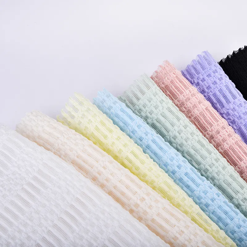 Proveedor de China Premium poliéster Spandex 4 vías estiramiento tejido crepé arrugado telas para vestido corsé ropa