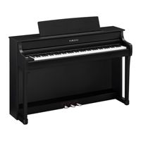 Piano droit haut de gamme Yamaha CLP-845B à 88 touches et trois claviers pour la préparation aux examens de musique.