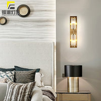 Applique murale LED en cristal de luxe postmoderne, design créatif, pour salon, chevet, longue bande, lampe de designer pour couloirs et halls