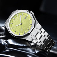 Montre pour homme avec lunette octogonale en acier inoxydable, cadran brossé, index lumineux, bracelet intégré, affichage de la date