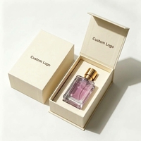 Boîte-cadeau magnétique personnalisée en forme de livre de luxe pour parfum avec inserts en mousse EVA, ensemble boîte et sac en papier