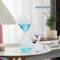 Vente en gros de sablier à eau liquide en verre à haute teneur en borosilicate personnalisé sablier coloré décoration moderne pour anniversaire personnalisé