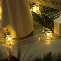 Mini guirlandes lumineuses LED en forme de rennes, 10 lumières LED alimentées par piles avec câble transparent pour la décoration de fenêtres et de murs de Noël