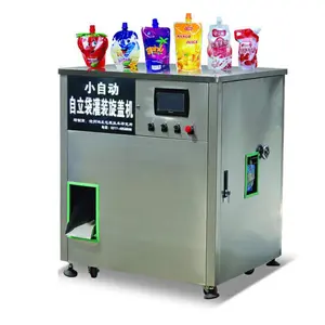Automatic spout pouch filing and capping machine for juice milk water filling machine