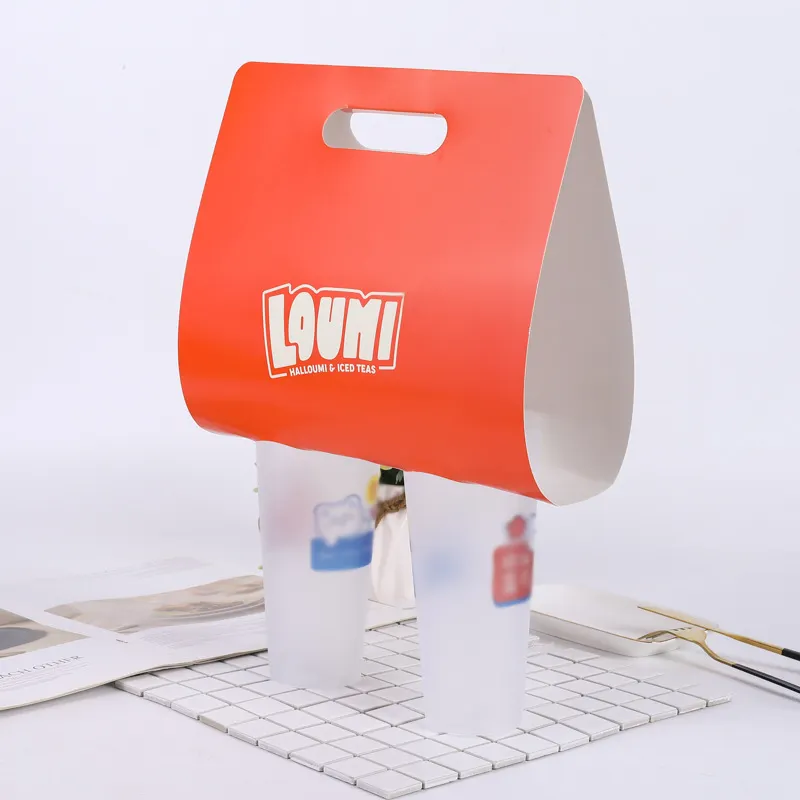 Fabrika geri dönüşümlü baskı tek kullanımlık paket Kraft kağıt tutucu özel taşınabilir içecek taşıyıcılar taşıması kolay kahve kupası tutacağı