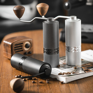 เครื่องบดกาแฟแบบมือหมุน Kafei Shi สแตนเลสแบบพกพา ชุดของขวัญสำหรับเมล็ดกาแฟ - Product Image 1