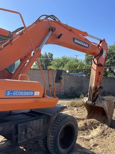 Excavatrice sur pneus Doosan DH150W-7 d'occasion populaire pour l'exportation, 15 tonnes, équipement hydraulique moteur et pompe, puissance 96 kW, capacité de la benne 0,75 m³ - Product Image 4