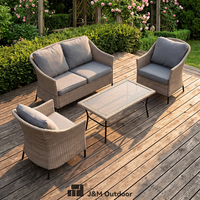 Ensemble de salon de jardin J&M T805 4 places en rotin écologique moderne, canapé deux places en osier, 2 fauteuils, table basse en verre, structure en fer