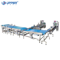 Machine d'emballage automatique pour gâteaux roulés suisses, gâteaux moelleux, barres chocolatées et emballages en forme de coussin