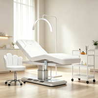 Table de massage électrique rose réglable pour spa avec trou facial et lumière LED, idéale pour salon de beauté (OEM)