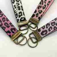 Accessoire de bijouterie imprimé léopard en métal et cuir pour femme, support de sac de voiture, pour le marché européen et américain