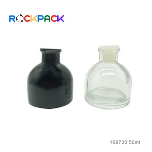Bottiglie di candela in vetro con diffusore a lamella per aromaterapia nero trasparente di forma rotonda da 50ml con bastone di legno