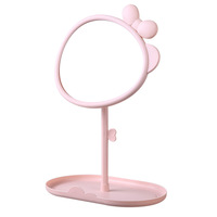 Miroir de maquillage de bureau rotatif en plastique à simple face avec grossissement 1x, idéal pour les étudiants en résidence universitaire, avec un design nœud papillon style princesse