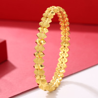 Vente en gros de bracelets creux plaqués or 24 carats, en alliage, larges, à motifs floraux en filigrane, bijoux de mode de mariage de Dubaï pour femmes