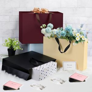 Sacs en papier carton noir ivoire de luxe personnalisés avec logo en feuille d'or, réutilisables, durables, recyclables, avec poignée en corde de coton pour les boutiques de vêtements - Product Image 4