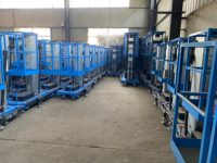 Petite table élévatrice à ciseaux électrique mobile en alliage d'aluminium pour la manutention des matériaux en entrepôt