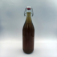 Botella de Vidrio Transparente Redonda de 1000 ml, 500 g, 1 L, Juego Completo a Precio Económico, con Tapa Abatible y Tapón Metálico