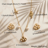 Collier pendentif en acier inoxydable plaqué or 18 carats, style plage et océan, avec étoile de mer, hippocampe, coquillage et fausse perle
