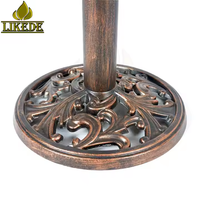 Table ronde en fonte avec finition cuivre vintage, base sur pied robuste avec plateau en mélamine pour café, bar, restaurant