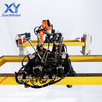 Sel Las MIG Robotik 6-Axis dengan Posisioner Sumbu Tunggal Ganda & Jig Pneumatik Khusus untuk Pengelasan Rangka Kursi Otomatis