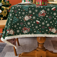 Nappe de Noël en jacquard, base verte avec motif Père Noël et bonhomme de neige, nappe à franges, protection de table saisonnière pour les dîners de fêtes