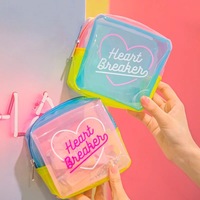 Célèbre sac organisateur en PVC à paillettes liquides convertibles pochettes à fermeture éclair pratiques polymorphes sac de rangement satisfaisant