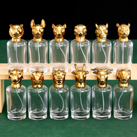 Flacon de parfum en verre transparent du zodiaque chinois unique de luxe de 50ml avec bouchon de pulvérisation en aluminium