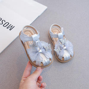 2025 Summer Girls' Baotou Sandals <b>with</b> Pearl <b>Bow</b> Comfortable Beach <b>Shoes</b> for Kids Fashionable Princess-Inspired Design - Product Image 1