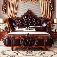 Lit de chambre à coucher de style européen en cuir véritable, taille king, en bois de caoutchouc massif, luxe classique, sculpté, style royal