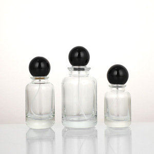 In Stock Wholesale 30ml Black Ball Cap Press Spray <b>Bottle</b> Travel <b>Sample</b> <b>Perfume</b> Cosmetic Container - Product Image 1