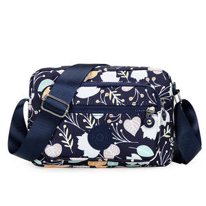 Vente en gros de tissu en nylon petit sac carré pour femmes sac de voyage durable coloré durable mère sac messager à poche zippée multicouche - Product Image 2