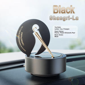 Mini ambientador de aire para coche con paraguas dorado giratorio con energía solar - Product Image 5