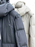 Veste matelassée épaisse à capuche et fermeture éclair en toile respirante avec logo personnalisé pour homme