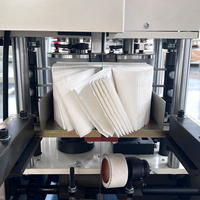 Machine automatique de fabrication de serviettes en papier, machine de pliage et d'embossage de serviettes en papier