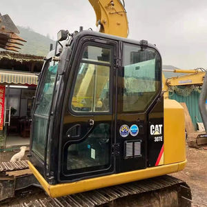Excavadora hidráulica CAT307E en estado original, revisión opcional disponible, ideal para reconstrucción de aceras y excavación de tuberías. - Product Image 1