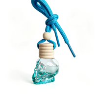 Diffuseur de parfum pour voiture en verre en forme de crâne, design unique, petite taille 8 ml, plusieurs options de couleurs, à suspendre dans la voiture