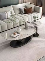 Combinaison de table basse ovale avec panneau en pierre artificielle